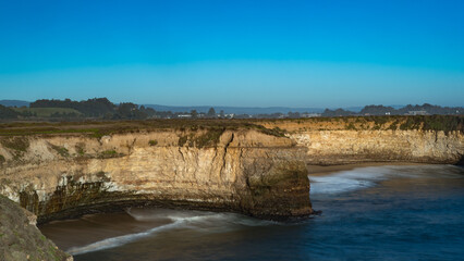 Shoreline at Wilder Ranch State Park in Santa Cruz, California, USA, featuring blue sky copy-space