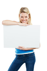 Fototapeta premium Allow me to introduce you to the future. Studio shot of an attractive young woman holding up a blank placard.