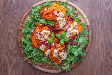 healthy salad with baked butternut pumpkin, feta cheese