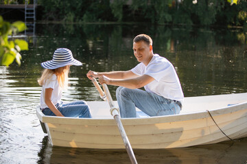 Couple man and woman ride on boat