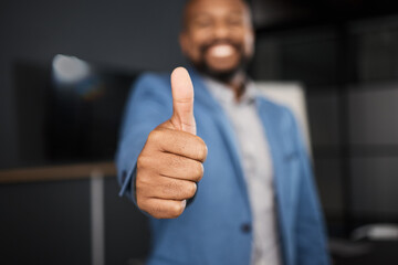 Thank you for al your efforts. Closeup shot of an unrecognisable businessman showing thumbs up in an office.