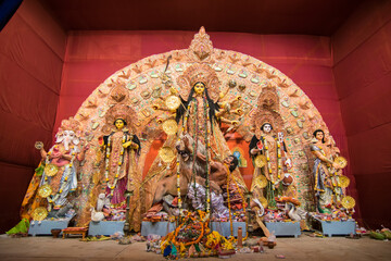 KOLKATA , INDIA - OCTOBER 18, 2015 : Night image of decorated Durga Puja pandal, shot at colored light, at Kolkata, West Bengal, India. Durga Puja is biggest religious festival of Hinduism.