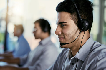 The expert advice you seek is just a call away. Cropped shot of a call centre agent working in an...