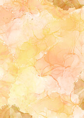 yellow splashes of alcohol ink on white as abstract background
