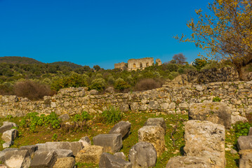 Fototapeta na wymiar KAUNOS, DALYAN, MUGLA, TURKEY: Ruins of the ancient city of Kaunos near the modern Turkish town of Dalyan.