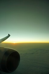 Sunset view from airplane's window 