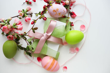 greeting card layout. bouquet of spring flowers, willow twigs and colorful Easter eggs