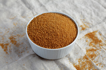 Brown Demerara Sugar in a Bowl, side view.