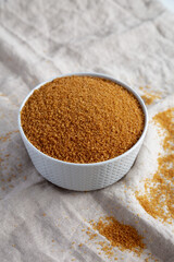 Brown Demerara Sugar in a Bowl, side view.
