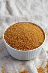 Brown Demerara Sugar in a Bowl, low angle view.