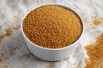 Brown Demerara Sugar in a Bowl, side view.