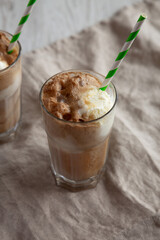 Homemade Ice Cream Float with Cola. Sweet Refreshment Drink, side view.