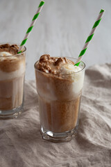 Homemade Ice Cream Float with Cola. Sweet Refreshment Drink, side view.