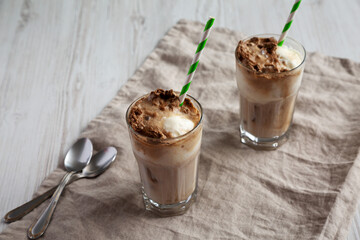 Homemade Ice Cream Float with Cola. Sweet Refreshment Drink, side view.