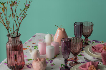 Fototapeta na wymiar Table setting, white plates with pink napkins