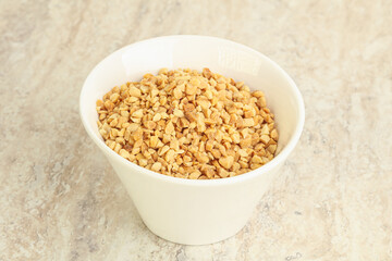 Crunched roasted peanut in the bowl