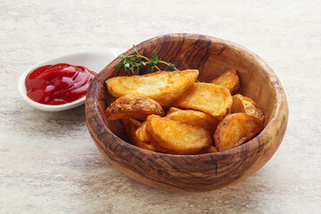 Fried rustic potato with tomato ketcup