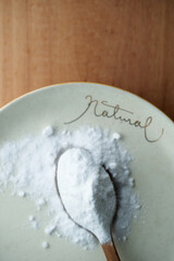 top view of baking soda on the blue background