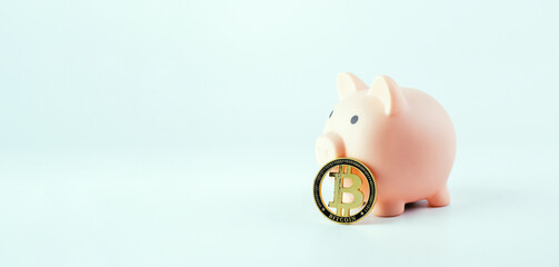 Save currency bitcoin. Pink pig bank with golden bit coin money BTC on white background. Save money investment and business finance.
