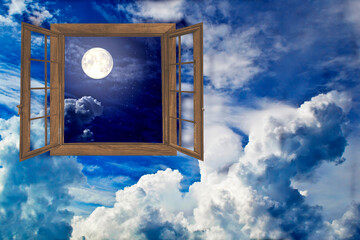 Window to the night sky against the background of the day - 496578917