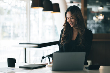 Beautiful Asian woman is a businesswoman who leads a new generation of startups, a woman who runs and manages a business plan to build confidence and stability in business, woman-led business concept.