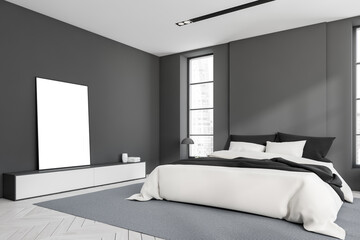 Grey hotel room interior with bed and window. Mockup frame on commode