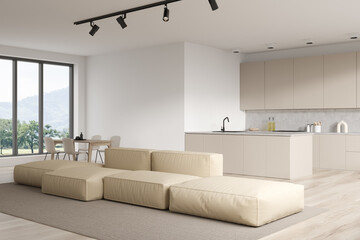 Corner view on bright studio room interior with dining table