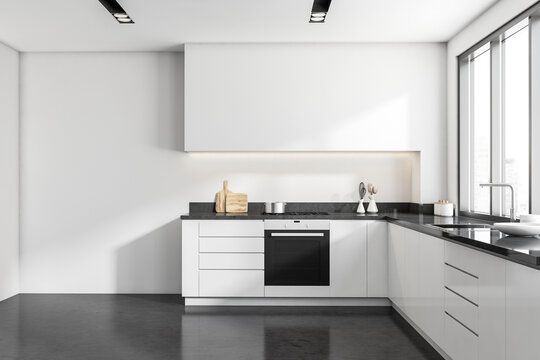 Front View On Bright Kitchen Interior With Empty White Wall