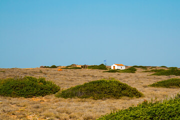 Uninhabited island northern Agistri island, Greece, with a building (weather measure station)