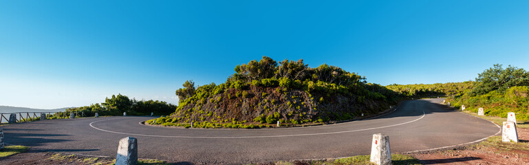 Fototapeta na wymiar Panoramic view of road turn in Madeira mountains