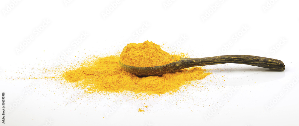 Canvas Prints turmeric powder and turmeric root on spoon wood ,turmeric is herb for protect virus.