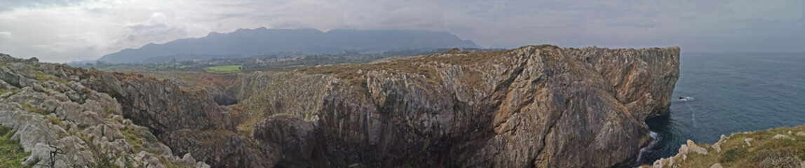 panoramic photo of the cliffs and beach of Prias, Asturias, Spain,