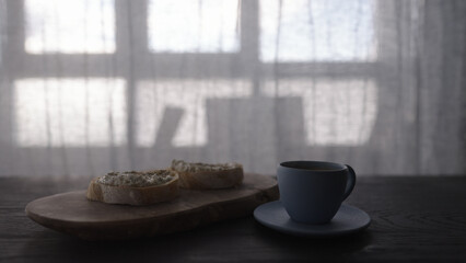 cup of espresso and ciabatta with cream cheese