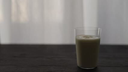 yogurt in tumbler glass with copy space