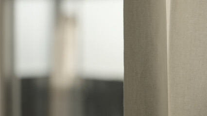 closeup shot of white curtains with evening light