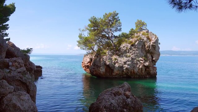Seascape of the Adriatic Sea, famous stone in Brela resort.