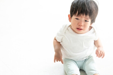 Crying and sad baby Copy space available