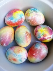 painted decorated easter eggs in a plate
