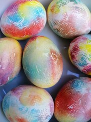 painted decorated easter eggs in a plate