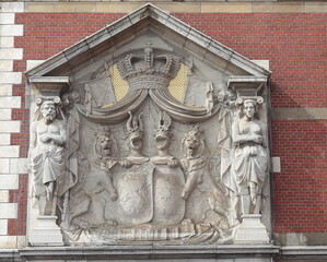 Amsterdam Central Station Building Exterior Sculpted Detail Depicting a Couple, Two Lions Holding Shields and a Crown, Netherlands