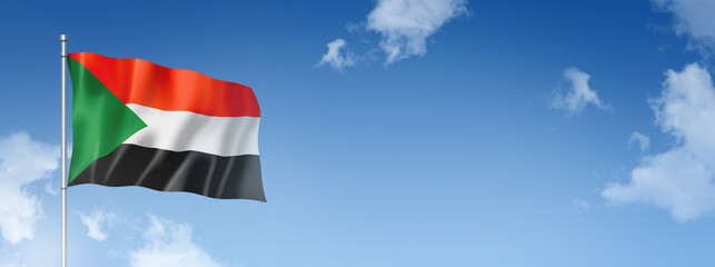 Sudan flag isolated on a blue sky. Horizontal banner