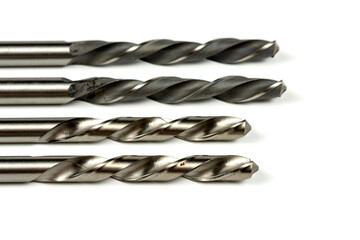 Drill bits of different sizes isolated over white background