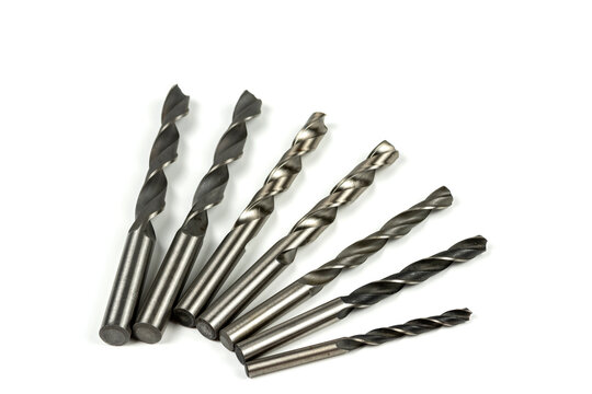 Drill bits of different sizes isolated over white background
