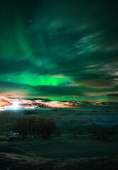 Obraz na płótnie Canvas Landscape. The Northern lights in the sky beyond the Arctic Circle.