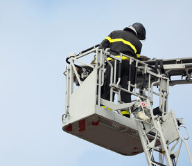fireman on ladder truck during the rescue of an injured person