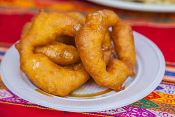 Traditional peruvian dessert Picarones. Selective focus