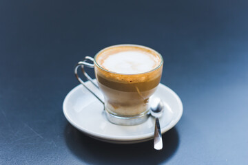 Cup of coffee on a dark background