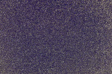Fototapeta premium Violet silver glitter twinkle abstract winter or Christmas holiday background with sparkles. Modern luxury mock up with sequins. Texture of colored porous rubber with spangles