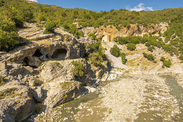 Holiday goers relax and go swimming in the thermal baths in Benje.