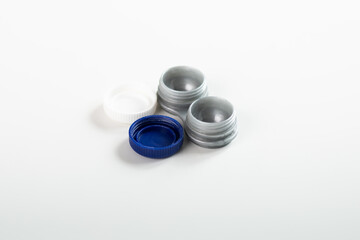 container of contact eye lenses on a white background